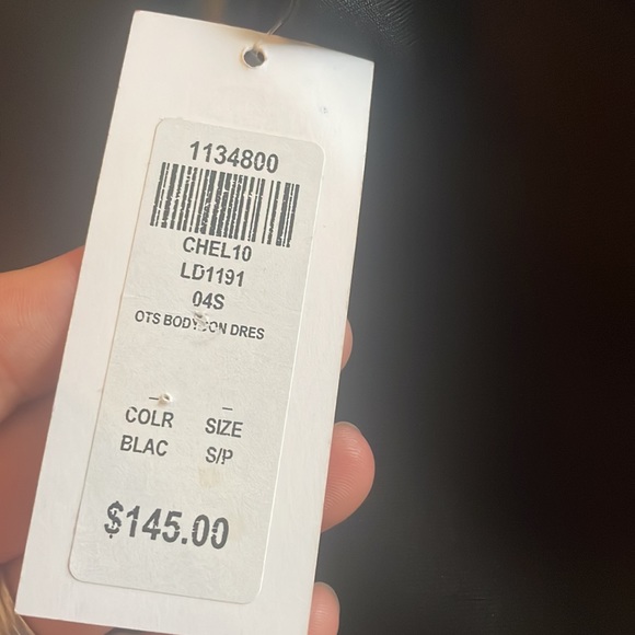 black mini dress with front and back cutouts. - Picture 5 of 5